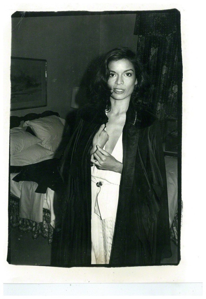 Andy Warhol, Bianca Jagger in black coat in Hotel Room, 1979