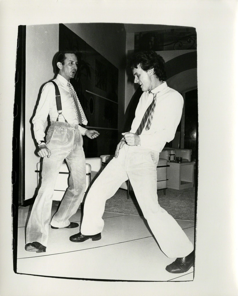 Fred Hughes Dancing with Unidentified Man, image 1