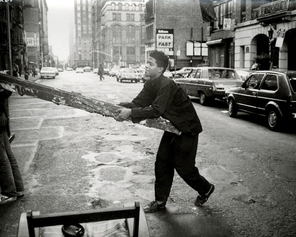 Andy Warhol, Jean-Michel Basquiat Carrying a ladder in Soho, 1984