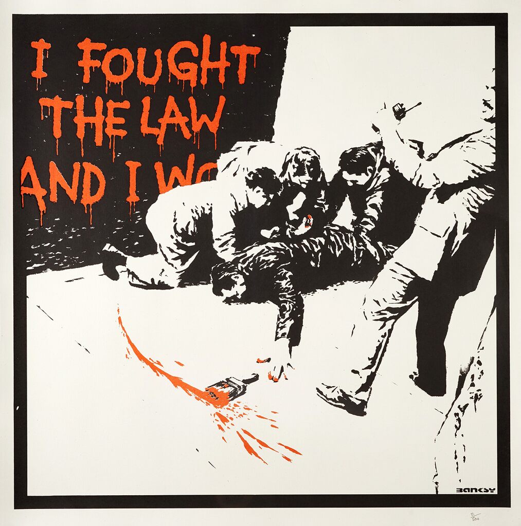 A prone figure is restrained by several people beside a paintbrush and orange splashes, below dripping orange lettering reading I FOUGHT THE LAW, with the final line partly obscured.
