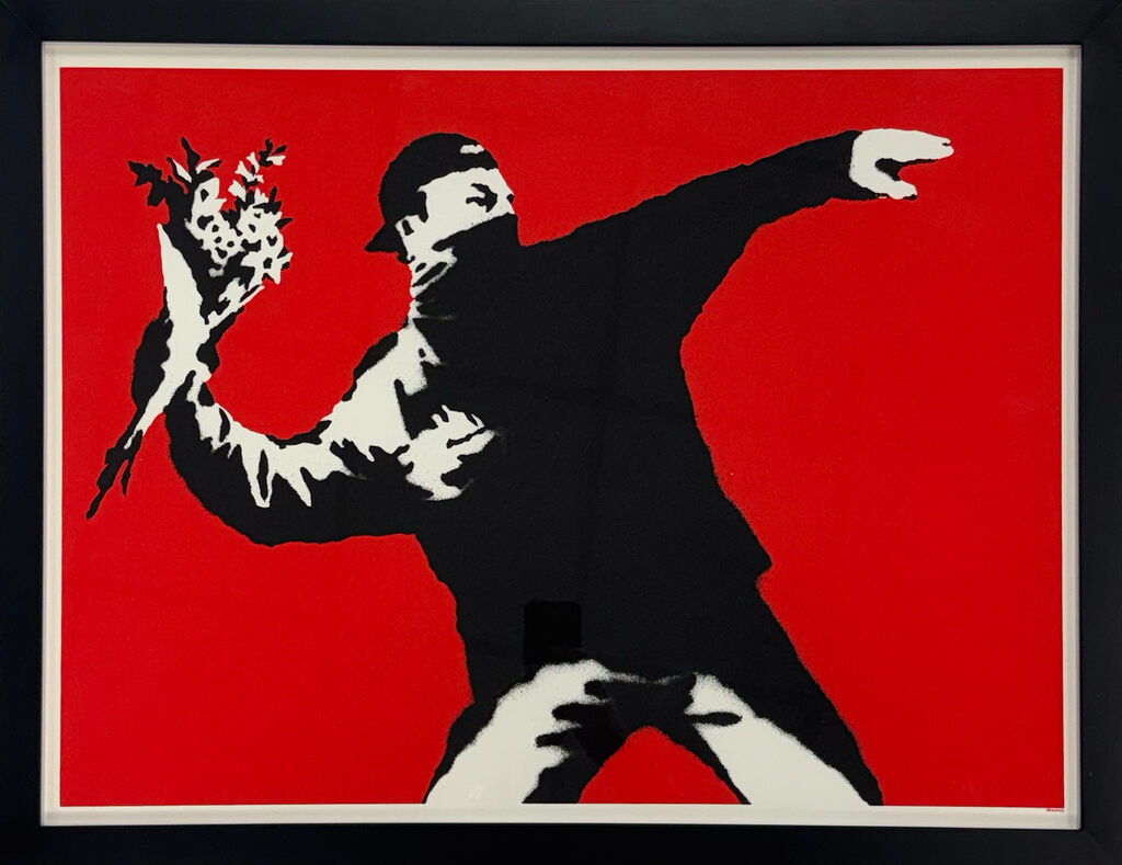 A black-and-white masked figure holds a bouquet in one raised hand, with the other arm extended diagonally upward to the right, against red.