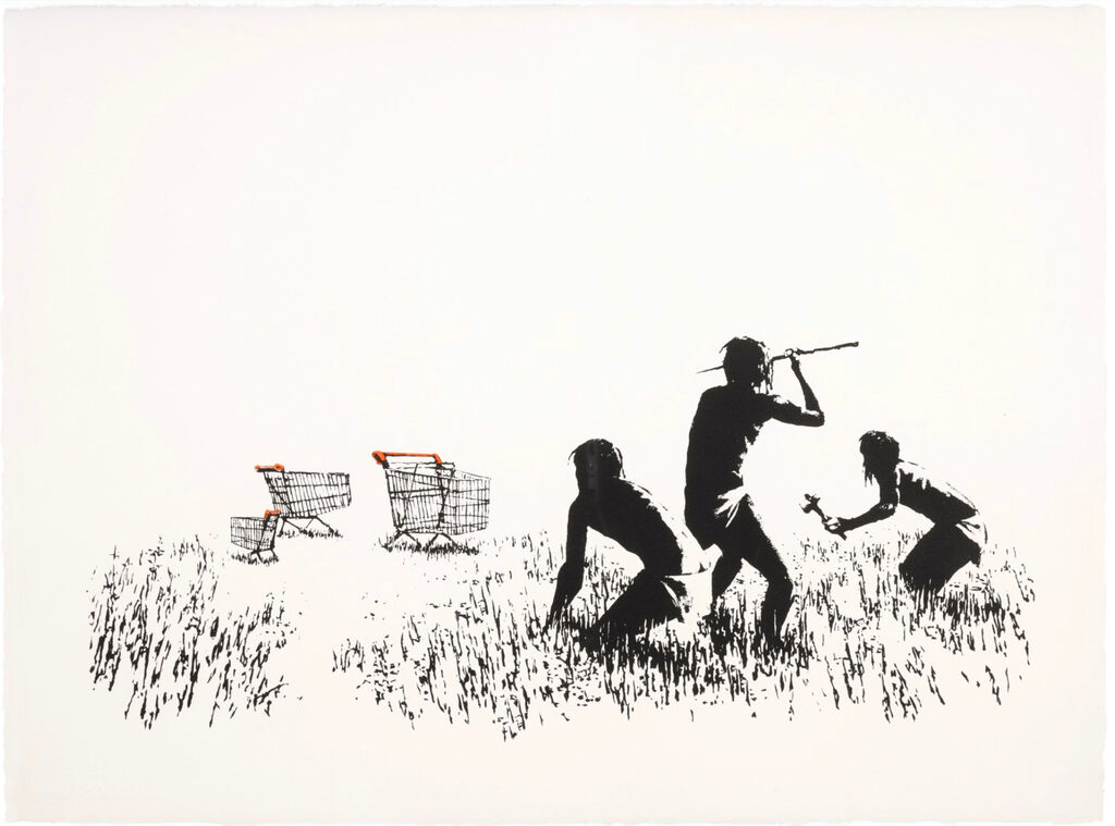 Three dark figures stand and crouch in grass opposite three shopping trolleys; the central figure holds a spear above his shoulder.