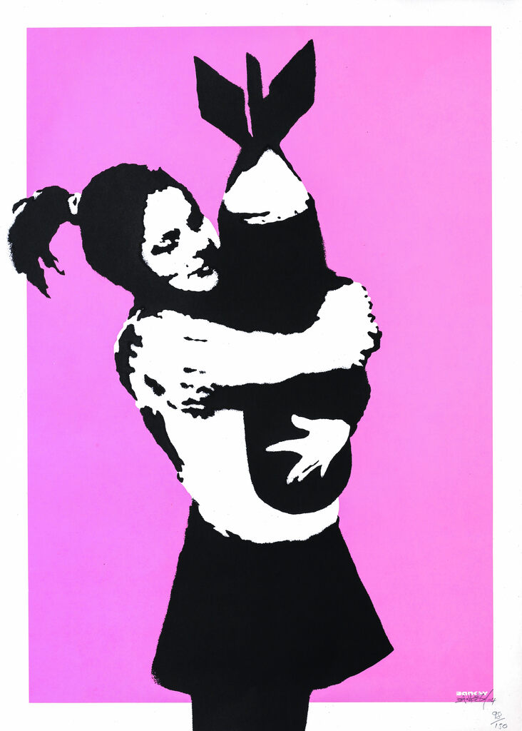 Black-and-white girl hugging a large bomb against vivid pink.