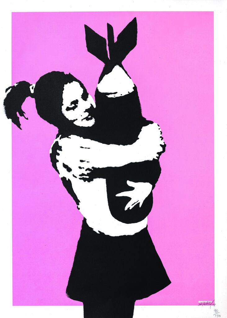 A black-and-white girl embraces a large bomb against bright pink.