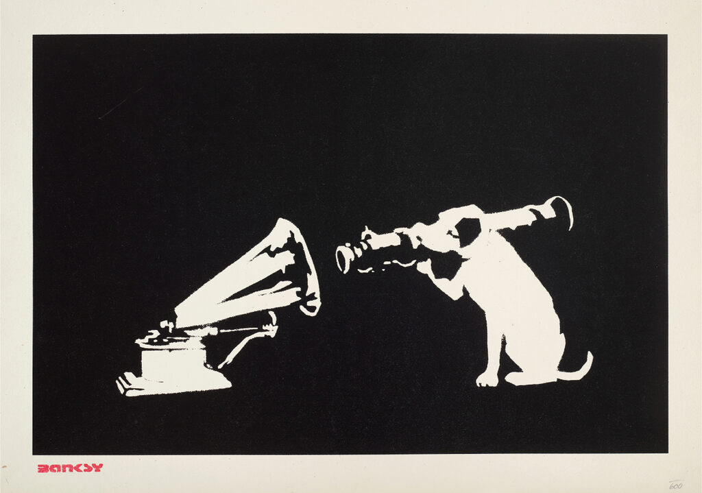 A white dog aims a tube-shaped weapon at a gramophone against black.