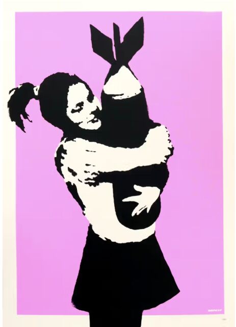 A girl hugs a large black bomb against bright pink.