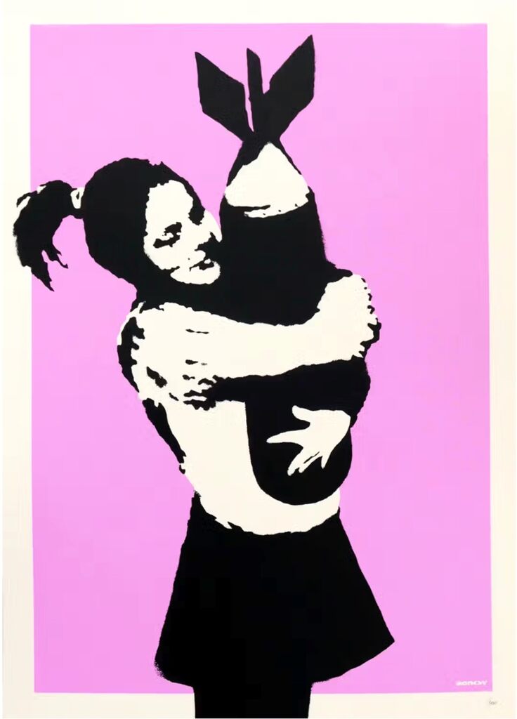 A girl hugs a large black bomb against pink.
