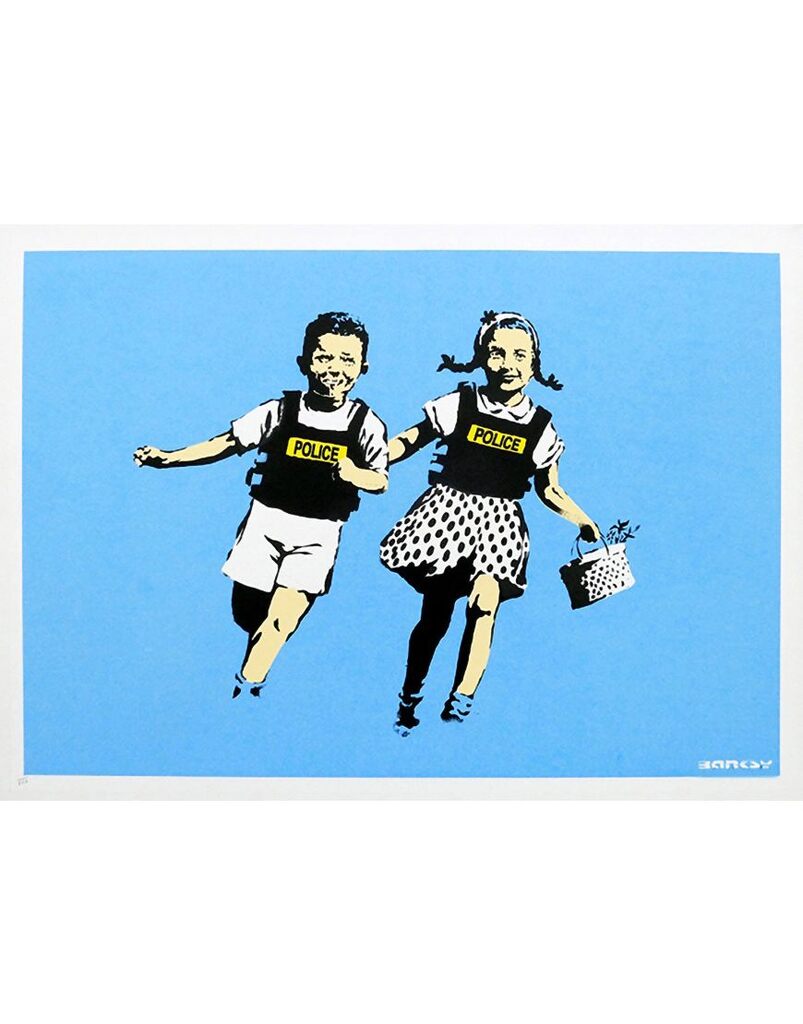 Two running children wearing police vests against blue.