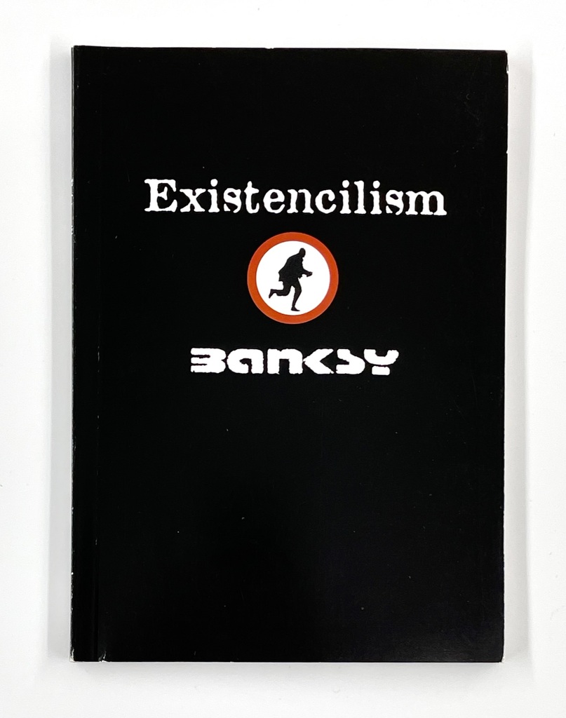 A black book cover reads Existencilism and Banksy around a small rat road-sign emblem.
