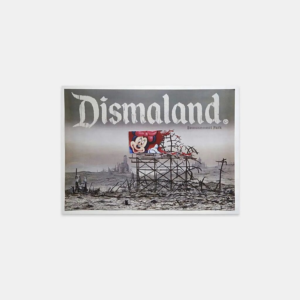 A small Dismaland cover shows a ruined amusement structure beneath large white lettering.